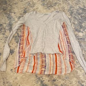 Cream light sweater with longer flowy printed back.Subtle Luxury brand size XS/S